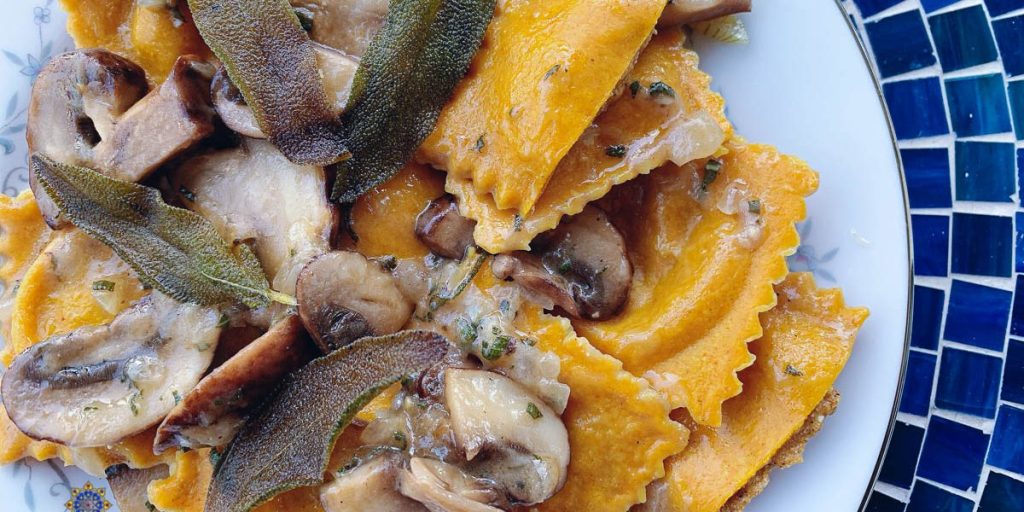 Pumpkin Ravioli with Mushroom Sage Pan Sauce - mezze & tapas